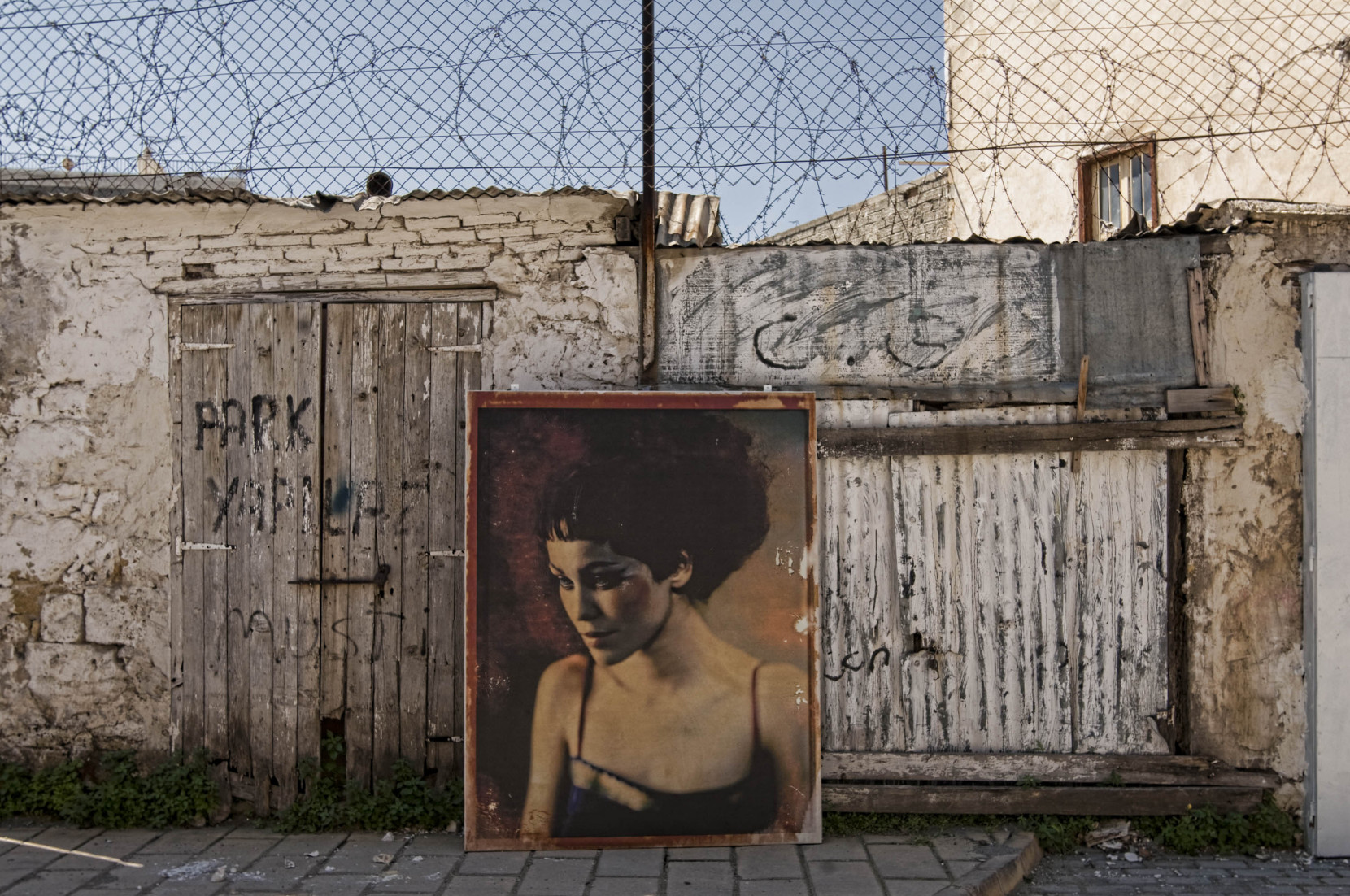 HasanHuseins-Portrait-Against-the-Wall-Nicosia-North-1660x1102.jpg